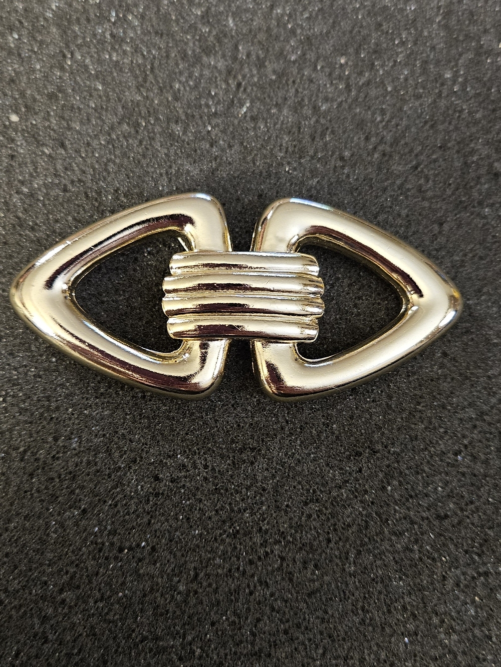 Stanley Gold-Tone Linked Bow Brooch.